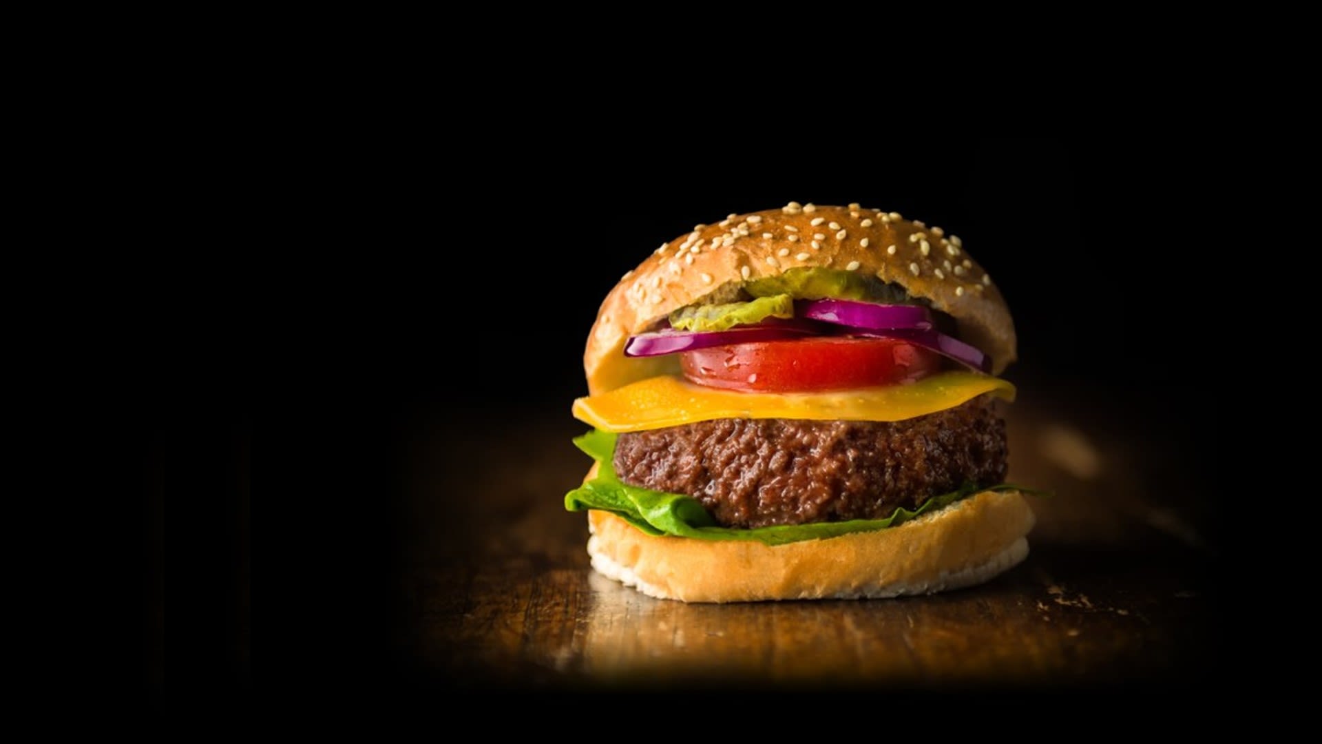 Photograph of what looks like a normal hamburger, created by alt-meat company Mosa